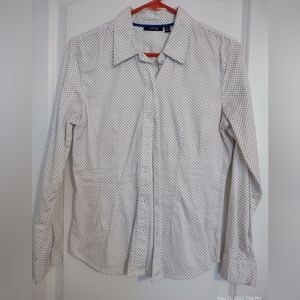 Perfect blouse for the office. White with black poka-dots, button down blouse.